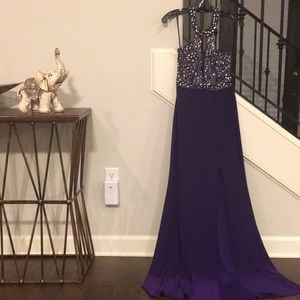 Purple strapless dress.